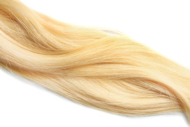 Photo of Locks of healthy blond hair on white background