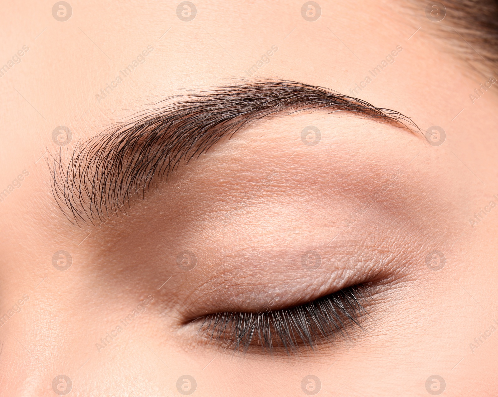 Photo of Beautiful woman with perfect eyebrow, closeup