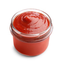 Photo of Tasty ketchup in glass jar isolated on white. Tomato sauce