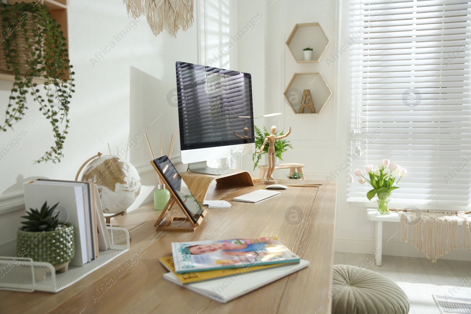 Photo of Stylish home office interior with comfortable workplace