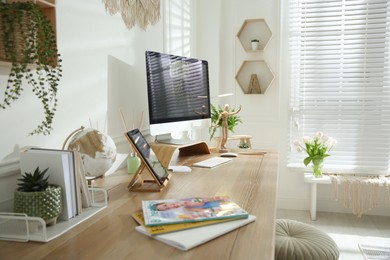 Stylish home office interior with comfortable workplace