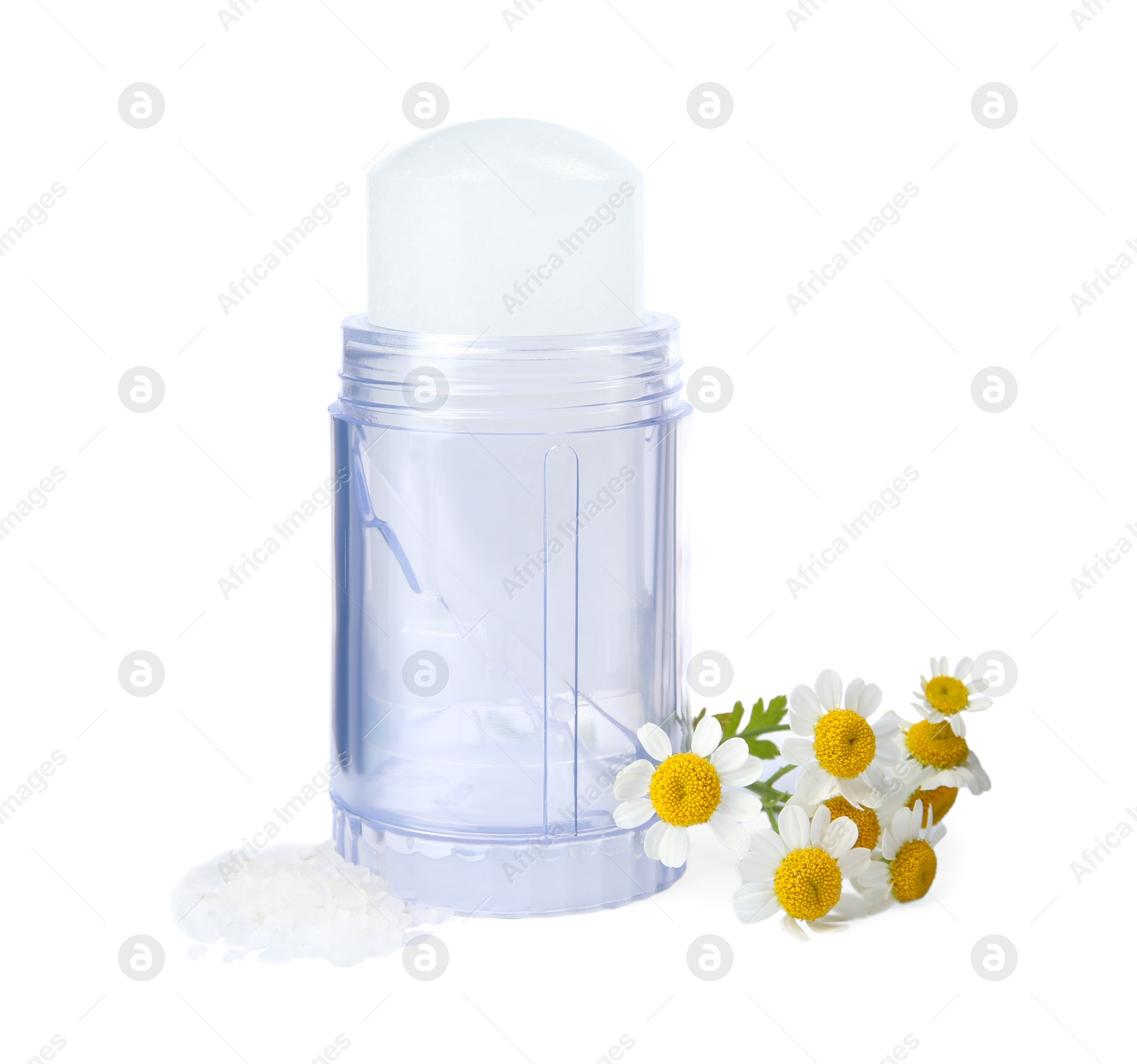 Photo of Natural crystal alum deodorant with chamomile flowers on white background