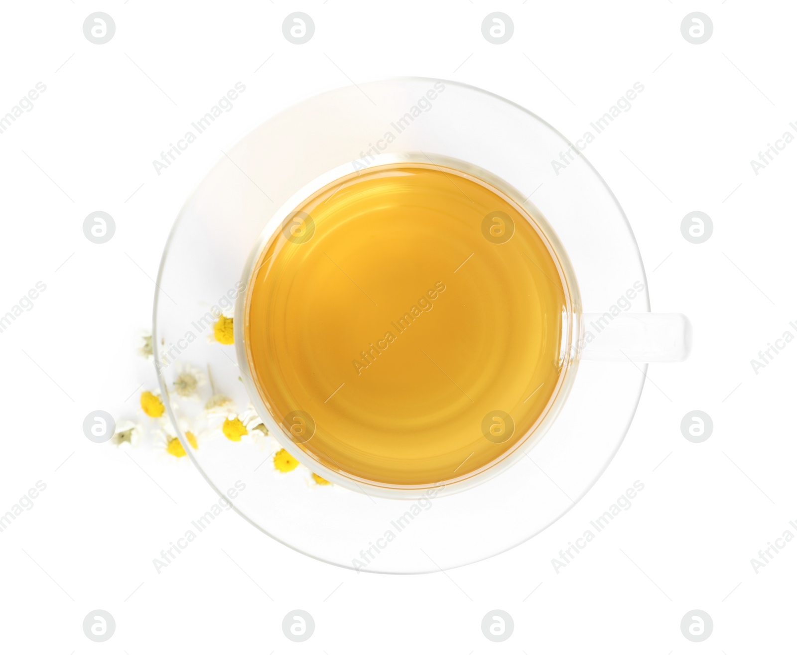 Photo of Fresh chamomile tea and dry flowers isolated on white, top view