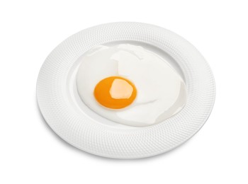 Plate with tasty fried egg isolated on white