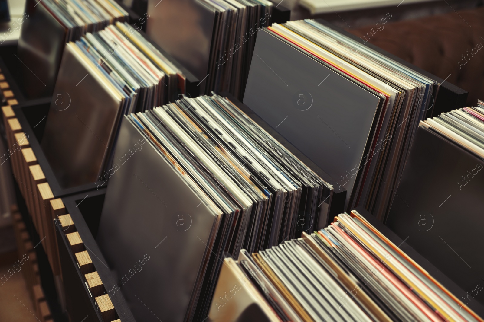 Image of Rack with different vinyl records in store