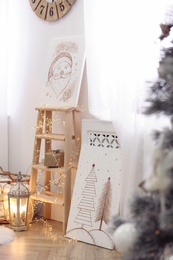 Beautiful Christmas pictures in festive room interior