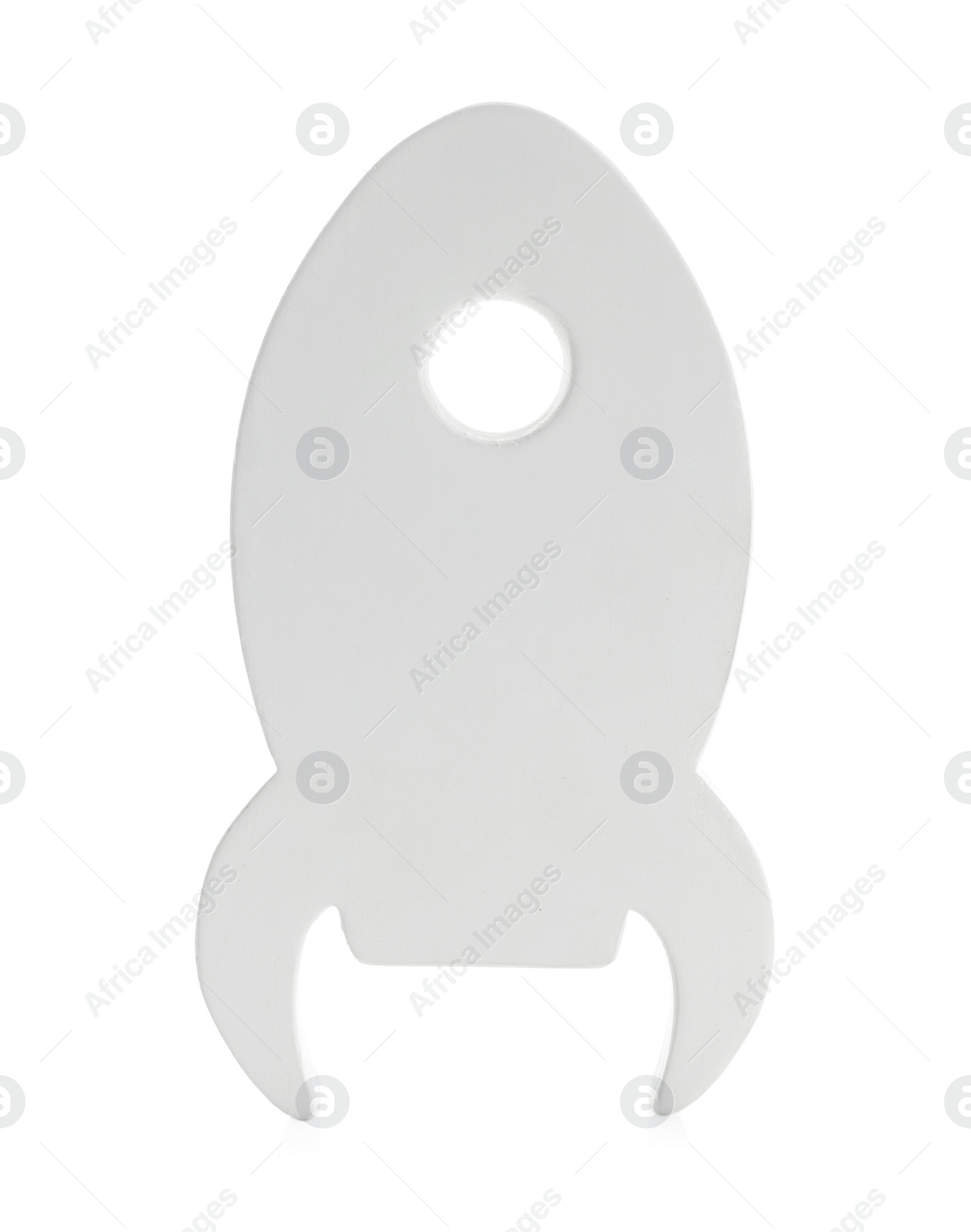 Photo of Rocket shaped child's night lamp isolated on white