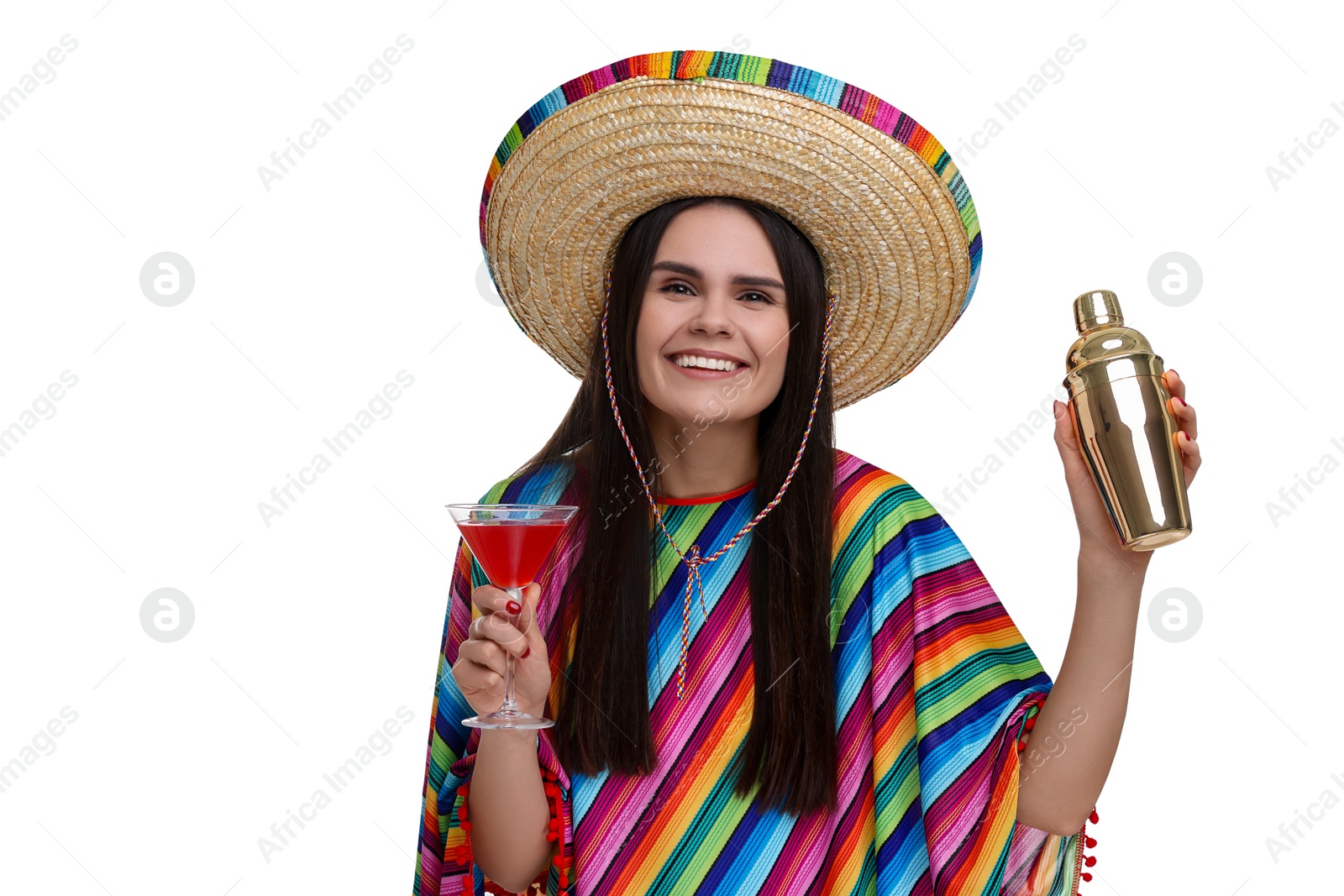 Photo of Young woman in Mexican sombrero hat and poncho with shaker and cocktail on white background