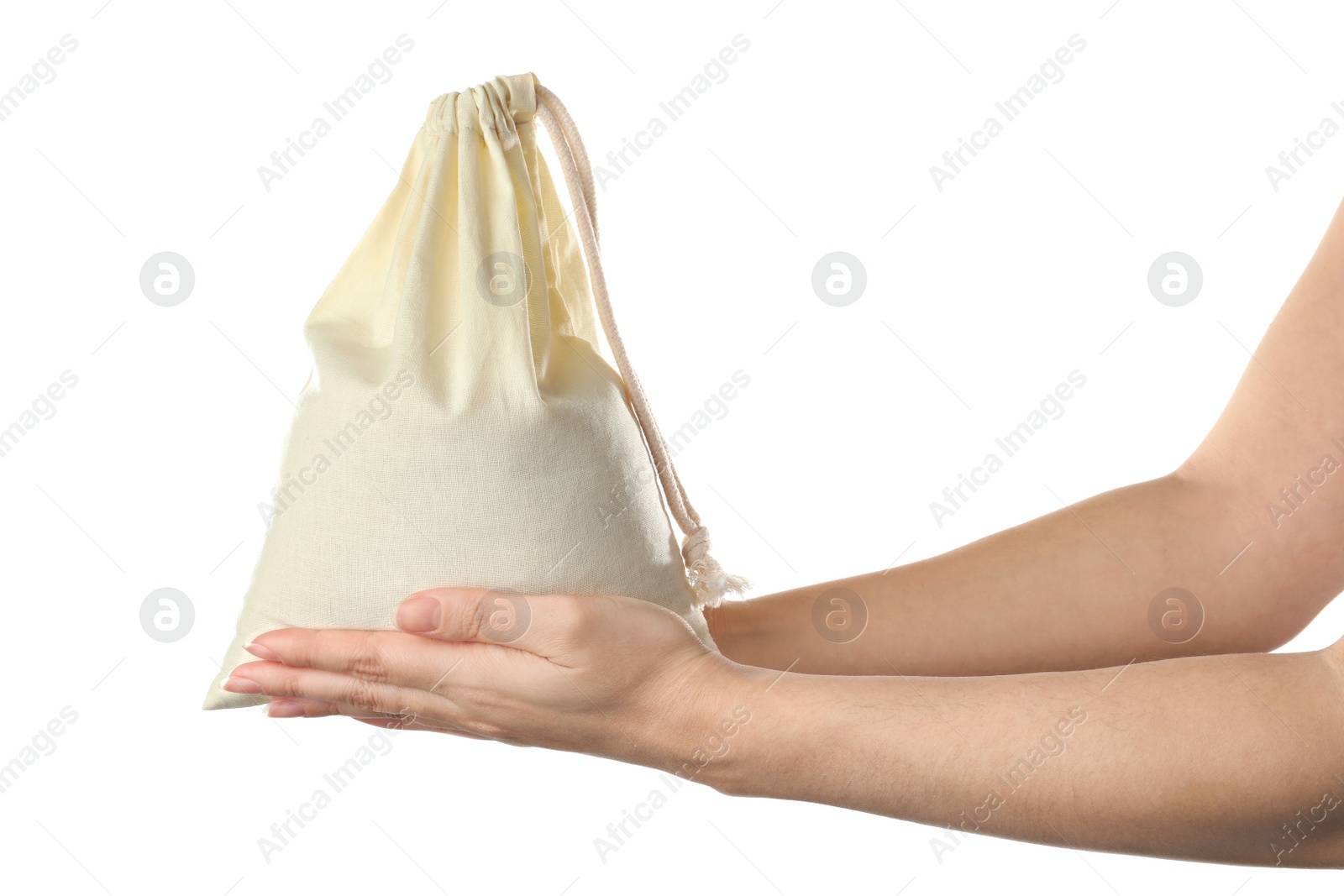 Photo of Woman holding full cotton eco bag on white background, closeup