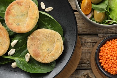 Healthy food high in vegetable fats on wooden table, flat lay