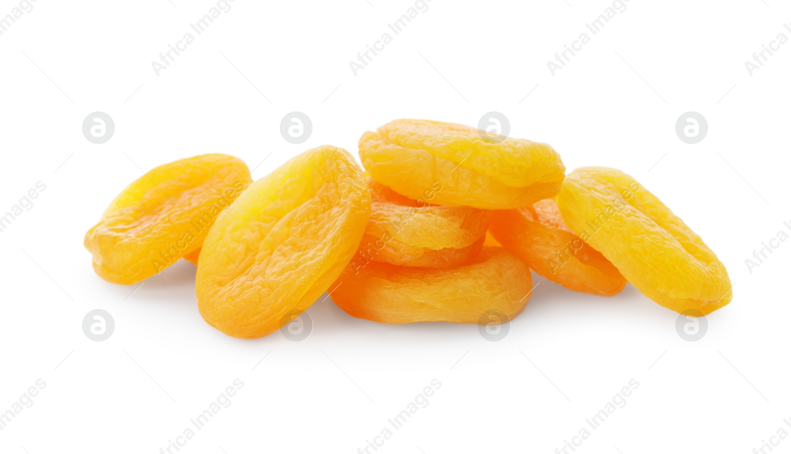 Photo of Pile of dried apricots on white background