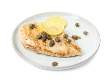 Photo of Delicious chicken fillet with capers and lemon isolated on white