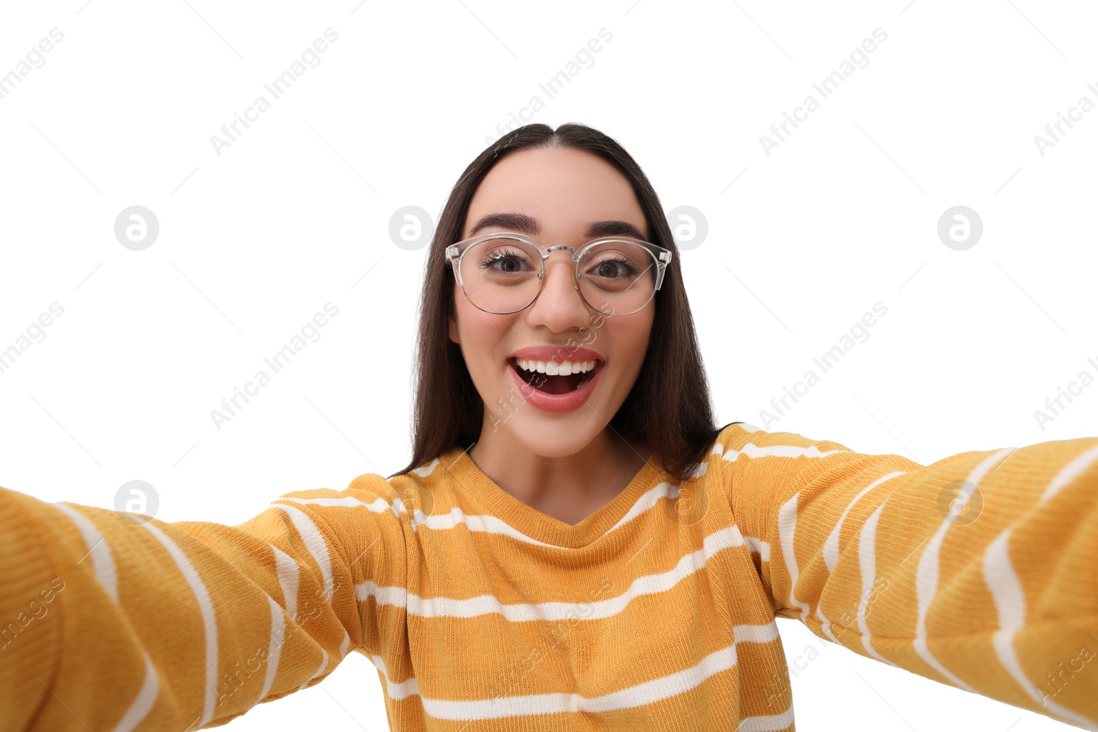 Photo of Smiling young woman taking selfie on white background