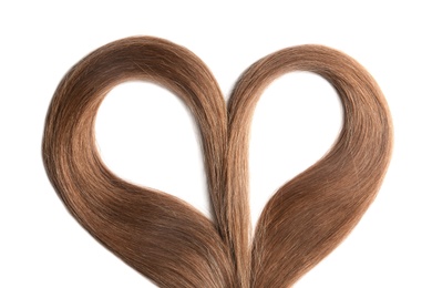 Photo of Heart made of brown hair locks on white background