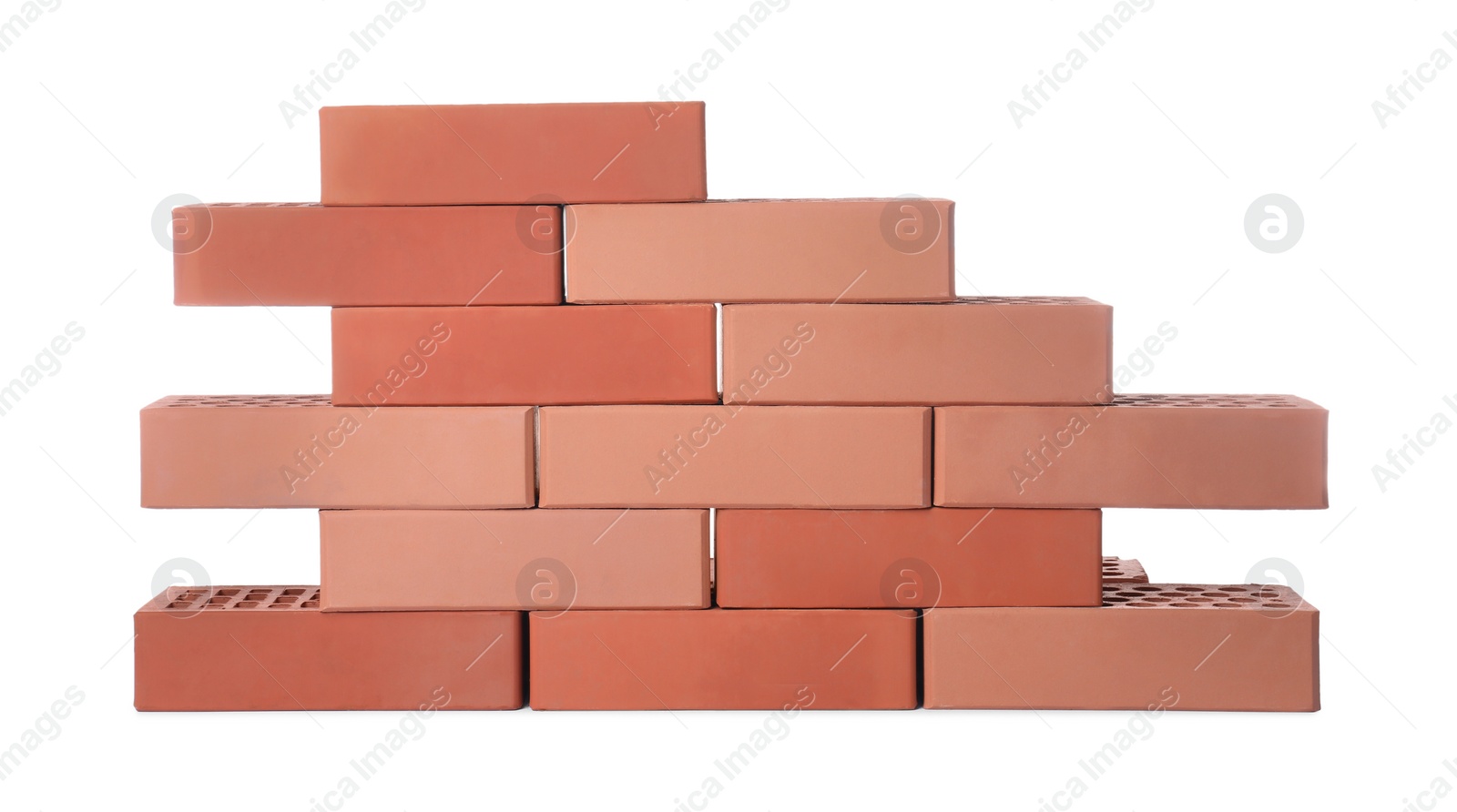 Photo of Many red bricks on white background. Building material