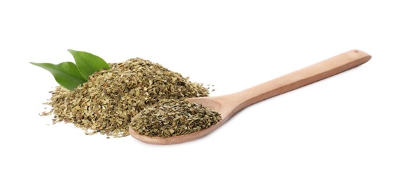 Photo of Pile of aromatic mate tea and spoon on white background