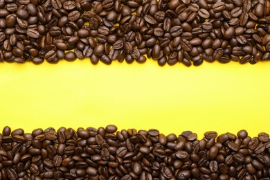 Photo of Coffee beans on yellow background, flat lay and space for text. Decaffeinated drink