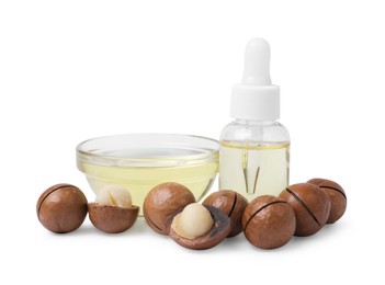 Delicious organic Macadamia nuts and natural oil isolated on white