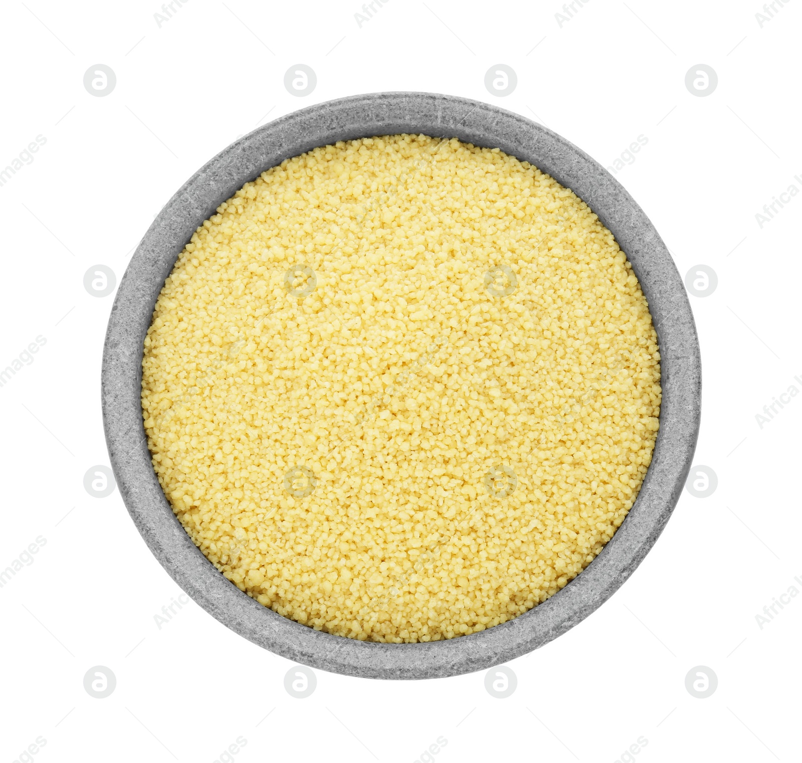 Photo of Bowl of raw couscous isolated on white, top view