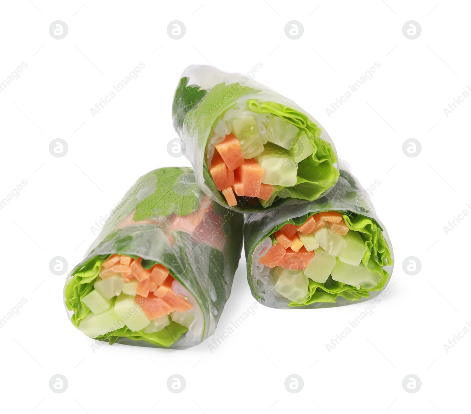 Photo of Different delicious spring rolls wrapped in rice paper on white background