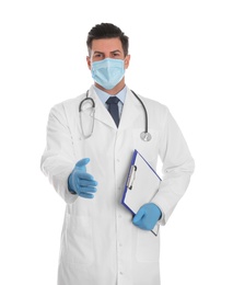 Photo of Doctor in protective mask and gloves offering handshake on white background