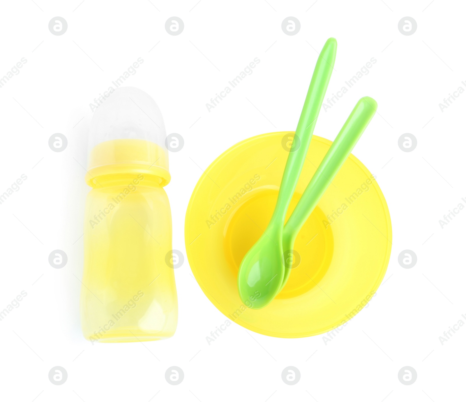 Photo of Set of plastic dishware isolated on white. Serving baby food