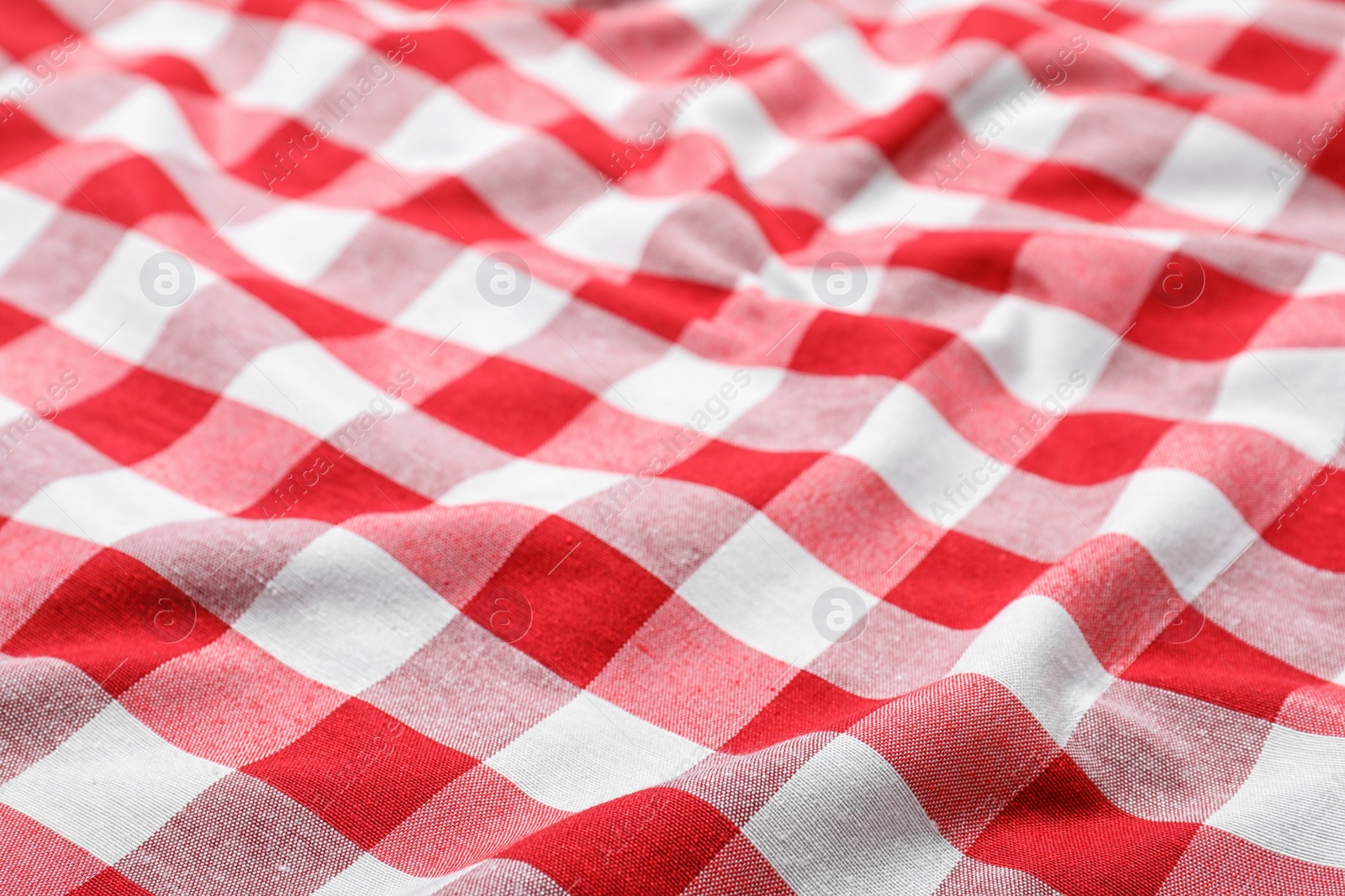 Photo of Classic red checkered picnic tablecloth as background