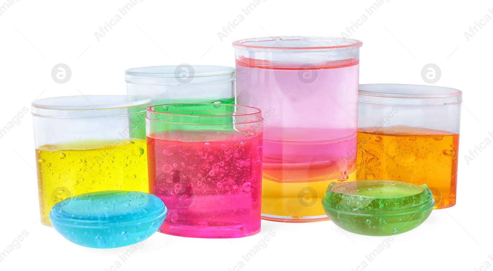 Photo of Colorful slimes in plastic containers isolated on white. Antistress toy