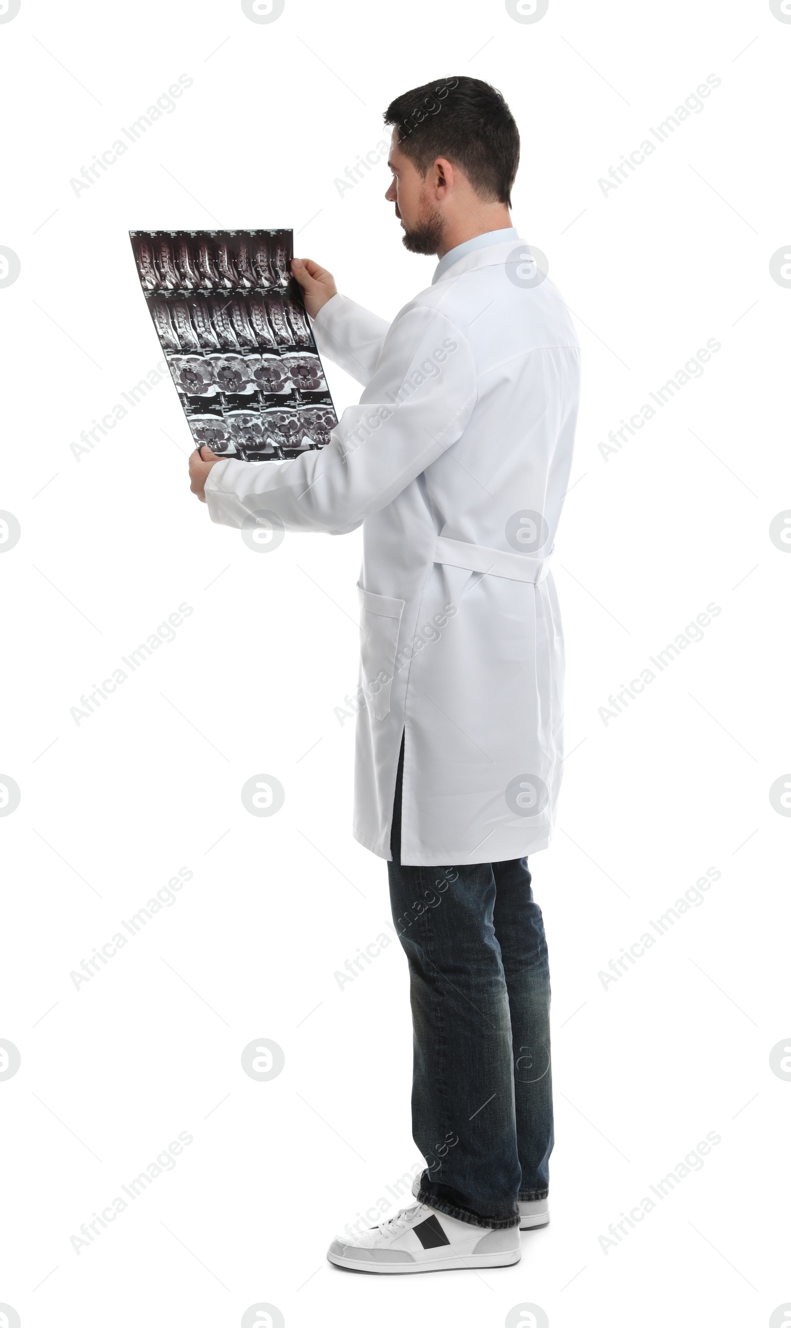 Photo of Orthopedist holding X-ray picture on white background