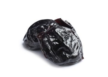 Photo of Tasty prunes on white background. Dried fruit as healthy snack