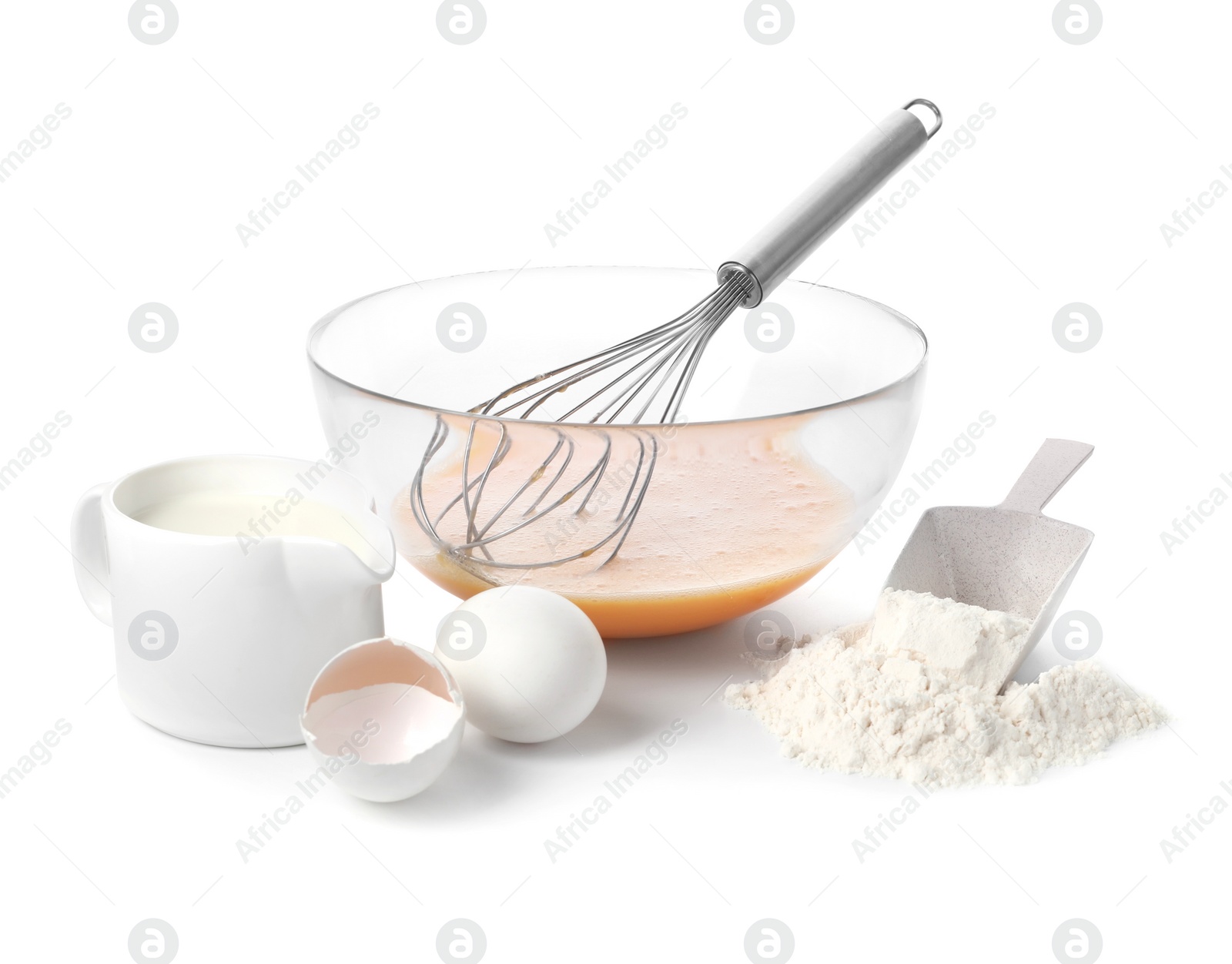 Photo of Making dough. Beaten eggs, metal whisk in bowl, flour and milk isolated on white