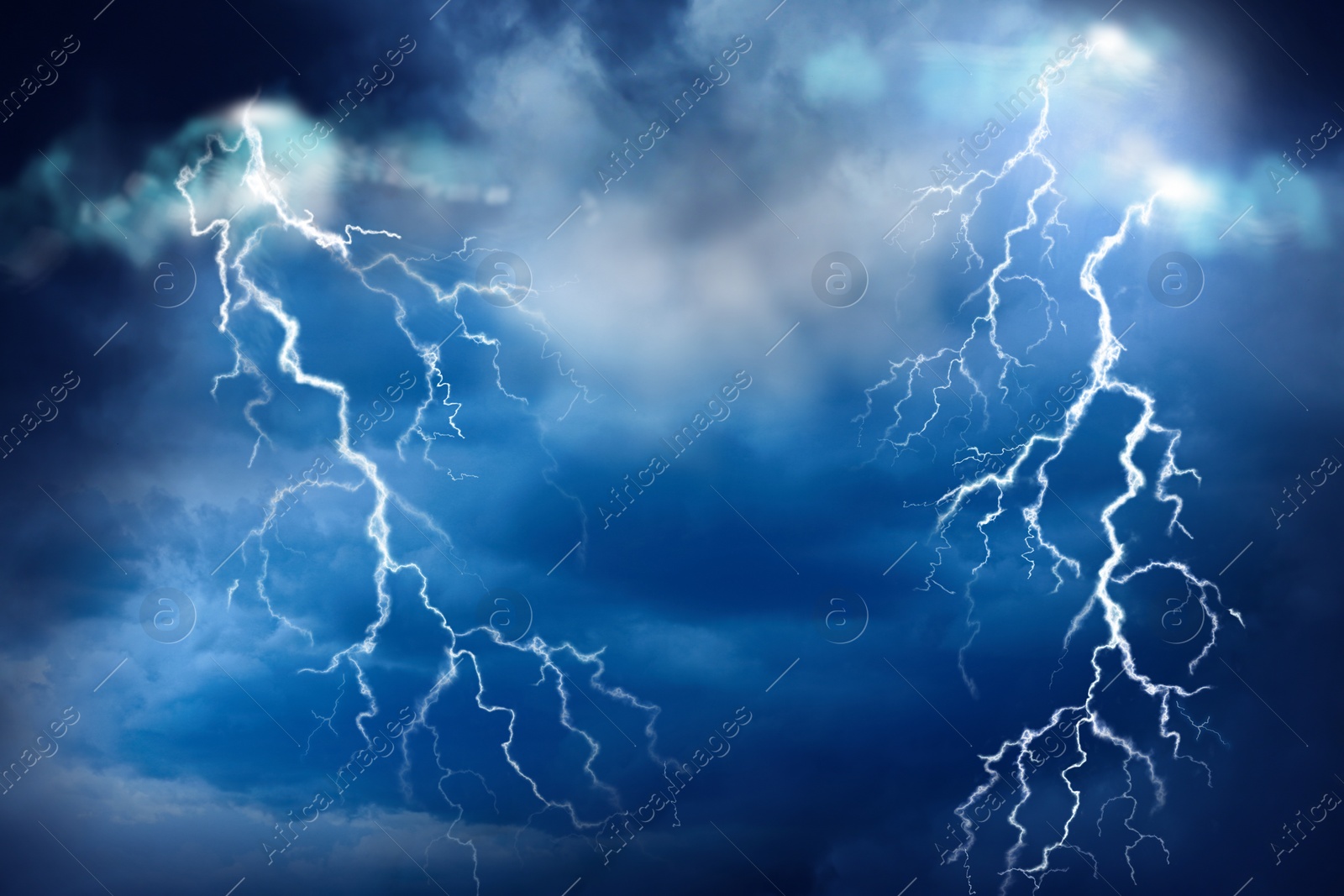 Image of Lightnings in dark cloudy sky during thunderstorm