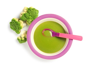 Plate with healthy baby food and broccoli on white background, top view