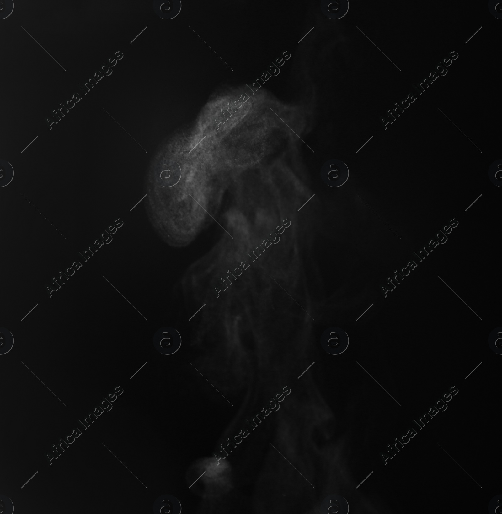 Photo of White steam rising on black background. Space for text