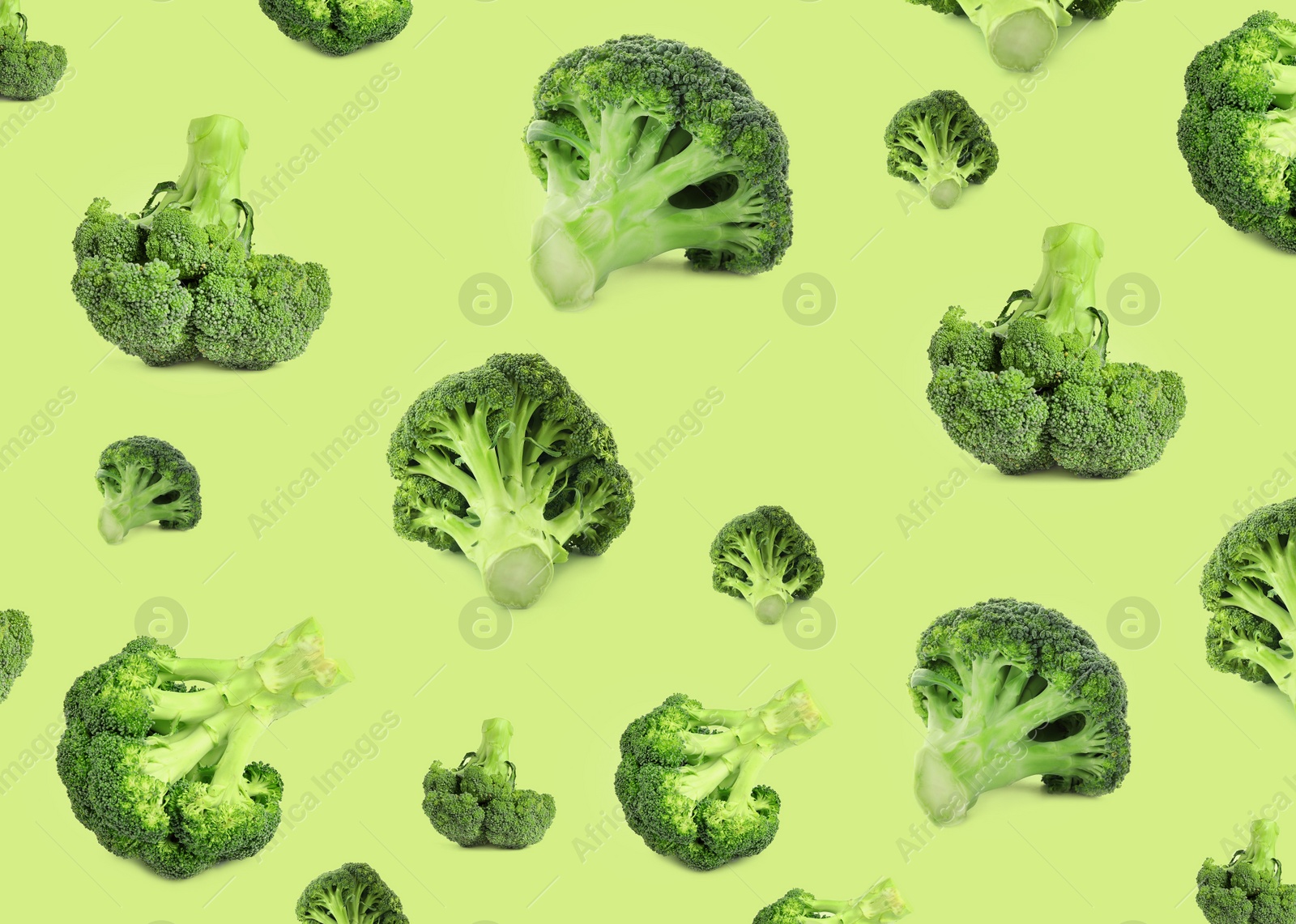 Image of Pattern of fresh green broccoli on light green background