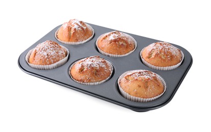 Photo of Tasty homemade muffins powdered with sugar in tray on white background