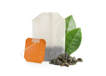 Tea bag with leaves on white background