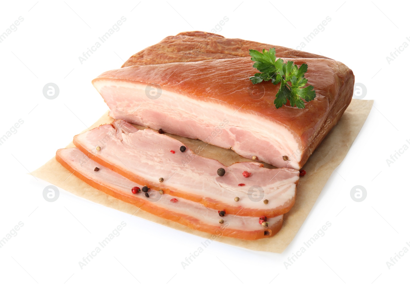 Photo of Delicious smoked bacon with parsley and peppercorns on white background