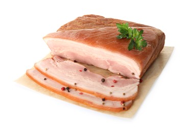 Photo of Delicious smoked bacon with parsley and peppercorns on white background