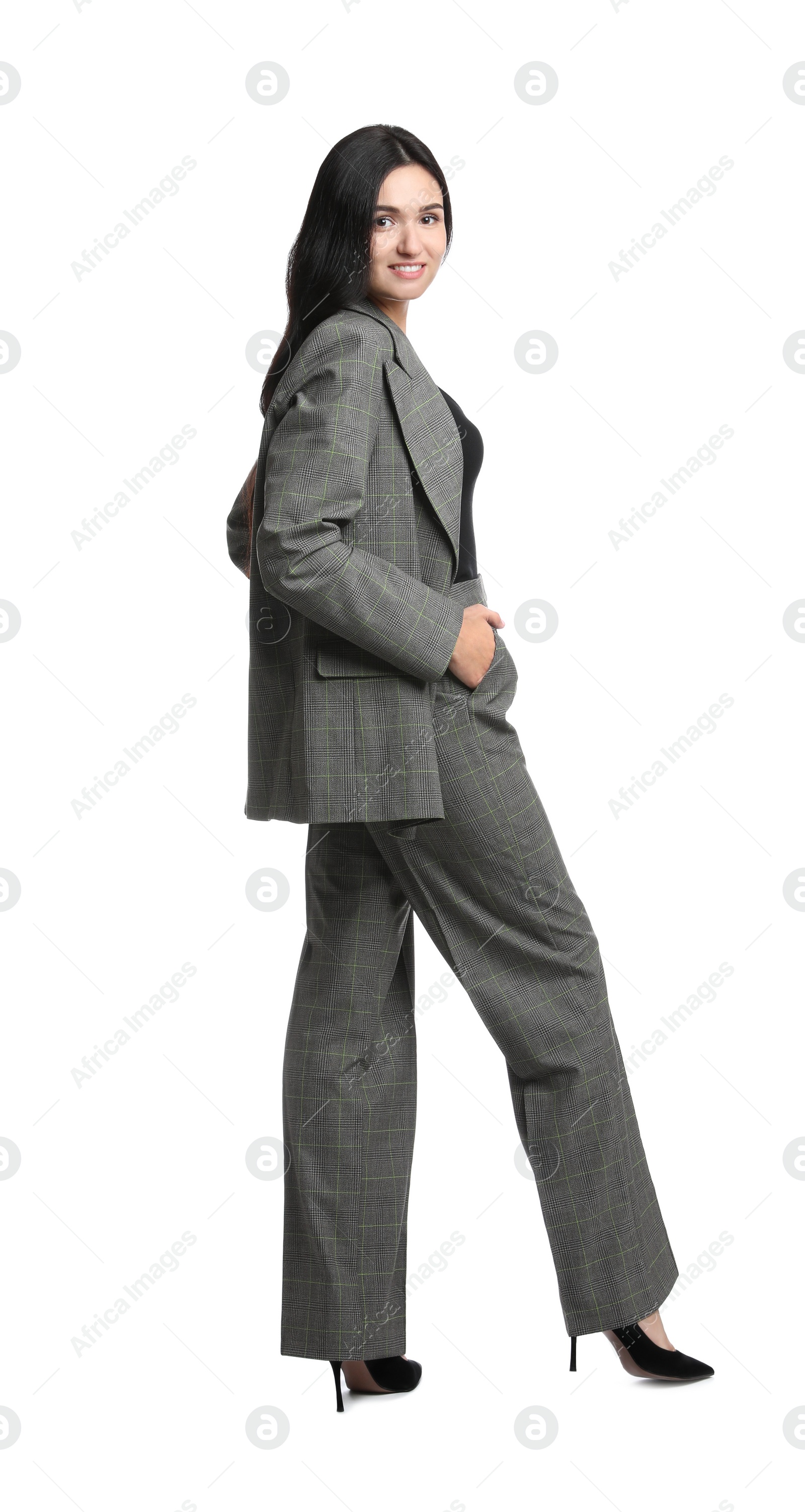 Photo of Full length portrait of beautiful woman in formal suit on white background. Business attire