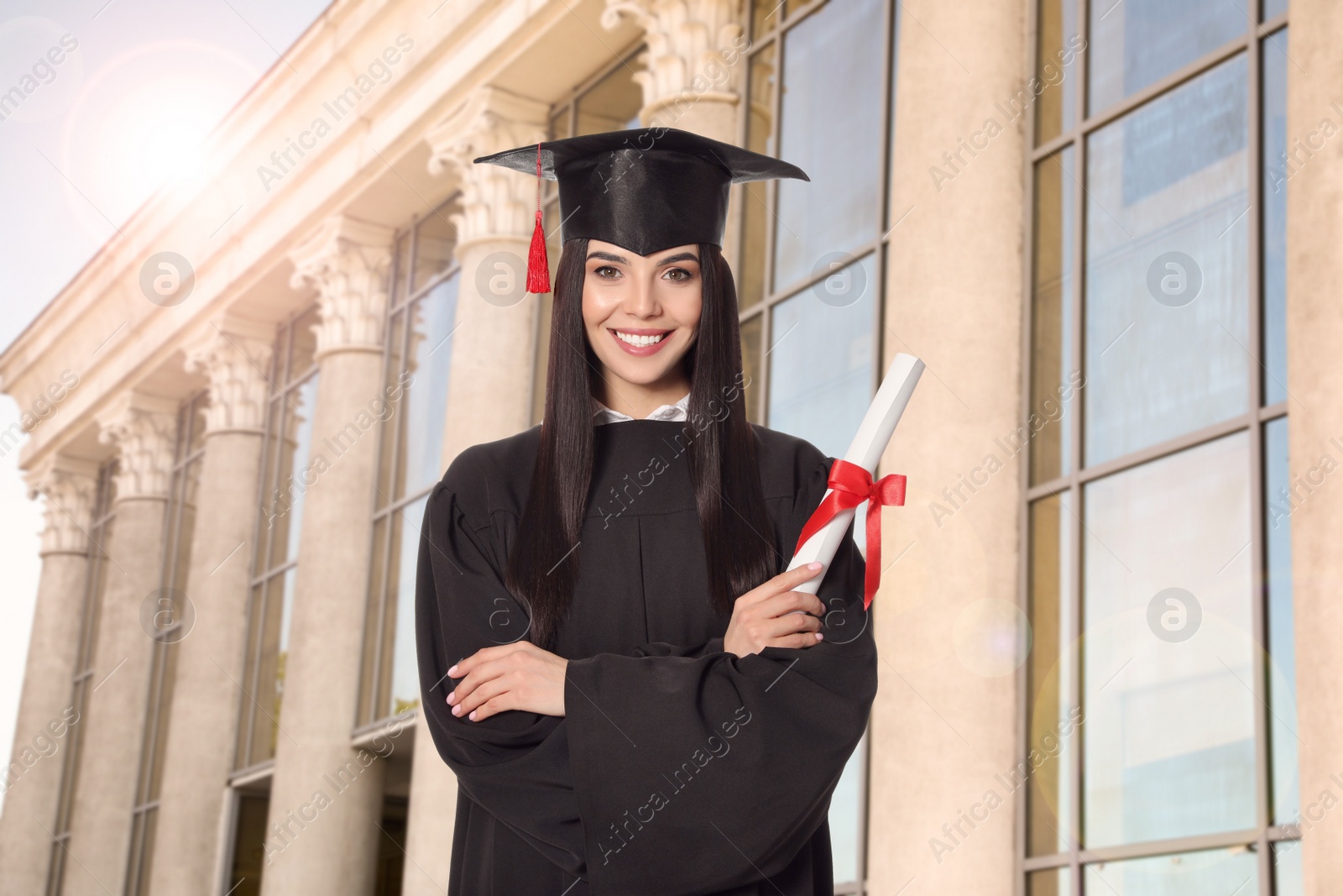 Image of Happy student with graduation hat and diploma outdoors 