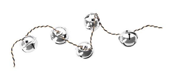 Photo of Shiny silver sleigh bells on white background, top view