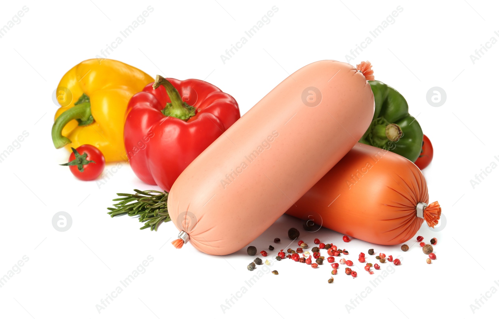 Photo of Tasty boiled sausages with vegetables, rosemary and peppercorns on white background