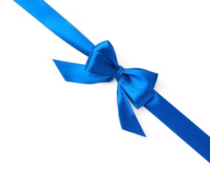 Blue satin ribbon with bow on white background, top view