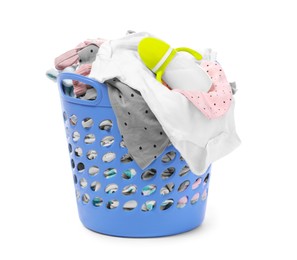 Laundry basket with baby clothes and bottle isolated on white