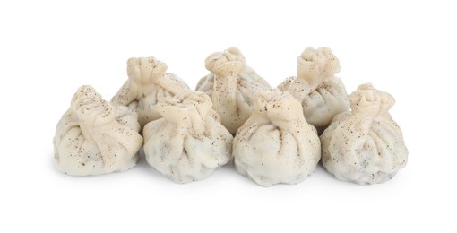 Many tasty khinkali (dumplings) and spices isolated on white. Georgian cuisine