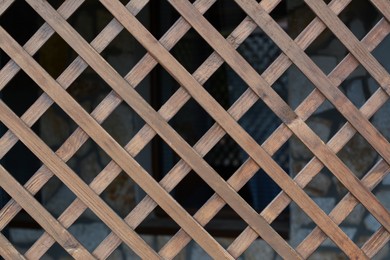 Texture of lattice wooden fence outdoors, closeup view