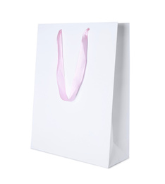 Photo of Paper shopping bag with pink handle isolated on white
