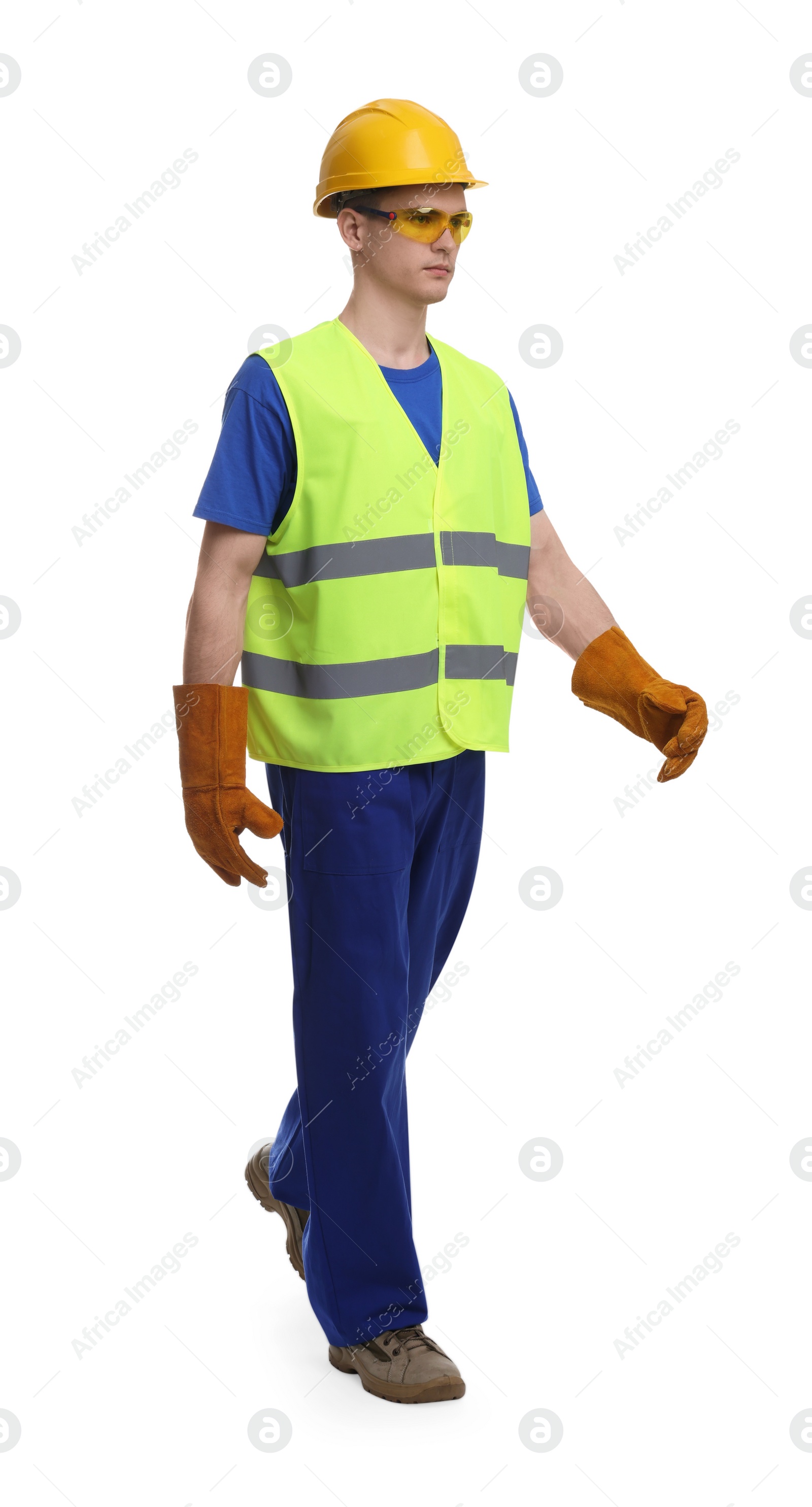 Photo of Young man wearing safety equipment on white background