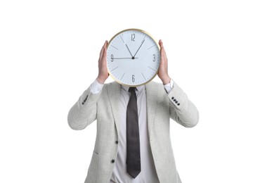 Businessman holding clock on white background. Time management